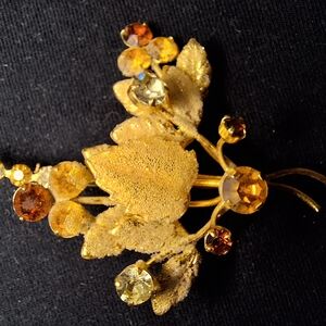 Elegant Gold Leaf Brooch with Amber Accents
